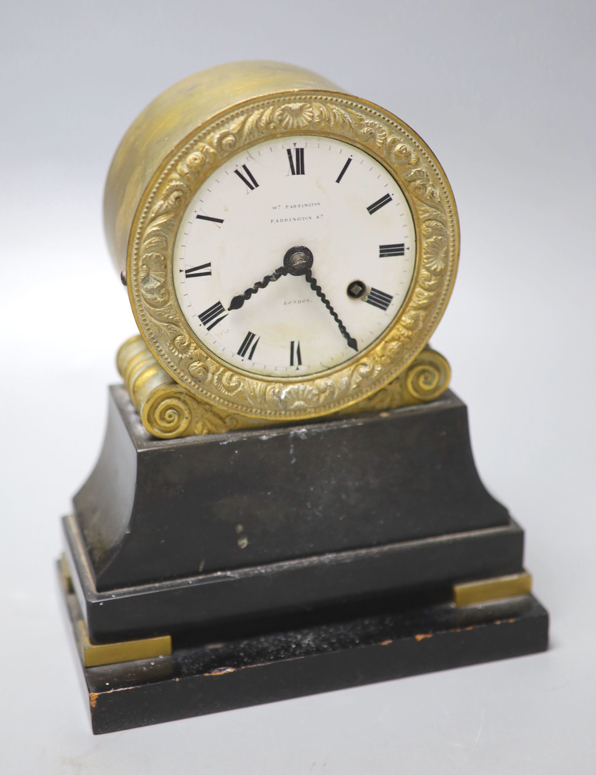 A Regency black slate and gilt brass mantel timepiece, signed Wm. Partington, Paddington St. London, 21cm high